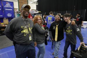 Mentor Donnell Conner, Sophomore Adisyn Moyer, Sophomore Ke'Mareya Russell, and Freshman Daniel Haggerty after a successful Impact Award Judging session.